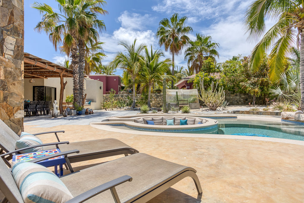 Courtyard pool chairs in the sun